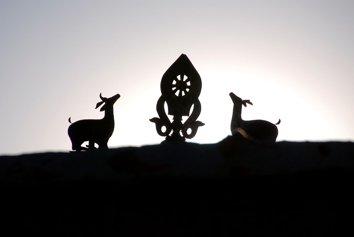 29 Deer And Dharma Wheel Above Old Zhongba Gompa Tibet At Sunset The traditional deer and Dharma wheel are above the Gompa in Old Zhongba in Tibet.